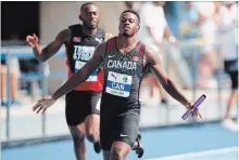  ?? MARK BLINCH THE CANADIAN PRESS ?? Aaron Brown of Canada crosses the line to win his team gold in the 4x100-metre relay during the NACAC Championsh­ips in Toronto.