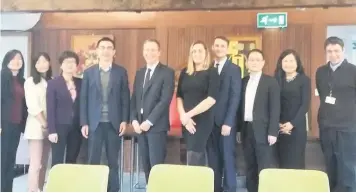  ??  ?? The delegation of senior officials from China with David Evans and Daniel Gale from Gloucester City Council and Natalie and Luke Wadley from Change Maker 3D