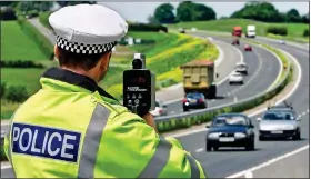  ??  ?? UNDER SCRUTINY: An officer checks speeds with a laser gun. Right: Former Chief Constable Meredydd Hughes