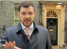  ?? ?? Phishing: Henry Zeffman broadcasts outside No10