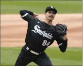  ?? CHARLES REX ARBOGAST — THE ASSOCIATED PRESS ?? Chicago White Sox starting pitcher Dylan Cease delivers during the first inning against the Los Angeles Angels on Monday in Chicago.