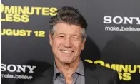  ?? The Associated Press ?? Fred Ward, a cast member in “30 Minutes or Less,” stands at the premiere of the film in Los Angeles on Aug. 8, 2011. Ward, a veteran actor who brought a gruff tenderness to tough-guy roles in such films as “The Right Stuff,” “The Player” and “Tremors,” died May 8, his publicist Ron Hofmann said Friday. He was 79.