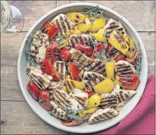  ?? [SARAH CROWDER VIA AP] ?? Grilled Provencal chicken and peppers