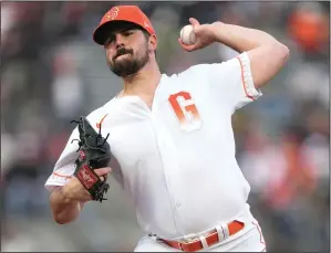  ?? THEARON W. HENDERSON/GETTY IMAGES ?? The Giants' Carlos Rodon pitches against the Athletics on Tuesday in San Francisco.