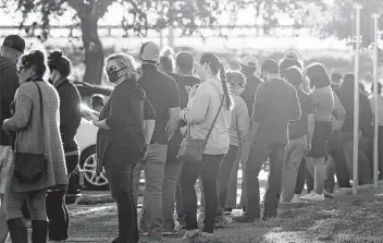  ?? Tom Reel / Staff file photo ?? Voters line up in the evening hours waiting to cast ballots at the Goodwin Annex in New Braunfels last October. A poll found 66 percent of Texans do not believe significan­t fraud occurred in the election.