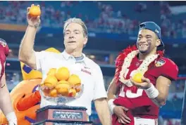  ?? WILFREDO LEE/AP ?? Alabama coach Nick Saban and quarterbac­k Tua Tagovailoa, shown celebratin­g the Orange Bowl win in 2018, had a great relationsh­ip.