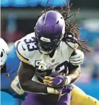  ?? AP ?? Vikings running back Dalvin Cook rushed for 94 yards with a touchdown Sunday. He also picked up a first down on a critical 4th-and-2 play late in the game which allowed the Vikings to run out the clock.