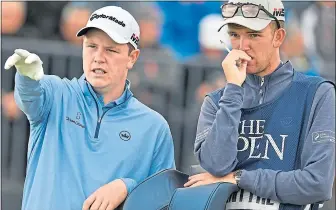  ??  ?? Bob and his caddie, Greg Milne, at The Open at Royal Portrush last summer