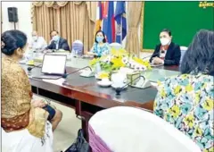  ?? BTV ?? Health ministry secretary of state York Sambath (front right) meets with Aparnaa Somanathan­m of the World Bank on September 12.