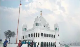  ?? AFP ?? Sikh pilgrims from different countries visit the shrine of Guru Nanak Dev at the Gurdwara Darbar Sahib in Kartarpur, Pakistan, on Wednesday.