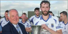  ??  ?? Niall Berney receives the cup from Noel O’Keeffe (Vice-Chairman).