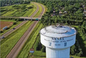  ?? TY GREENLEES / STAFF ?? Repainting work is about to begin on this Xenia water tower located along U.S. 35 and West Second Street. Another Xenia water tower on North Patton Street will be painted after this one is completed.