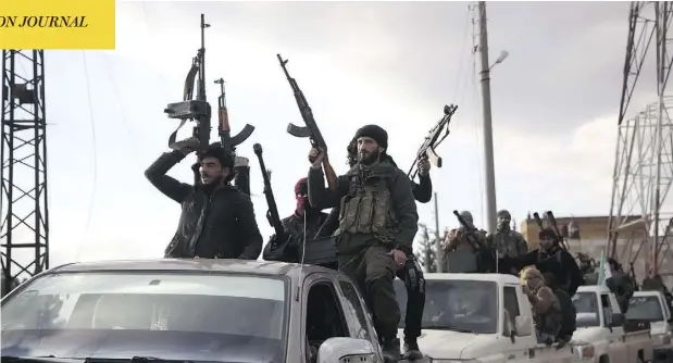  ?? BAKR ALKASEM / AFP / GETTY IMAGES ?? Turkish-backed Syrian fighters gather in the area of Sajour between the northern Syrian towns of Jarables and Manbij on Friday.