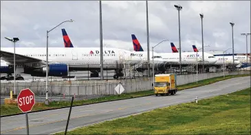  ?? HYOSUB SHIN / HYOSUB.SHIN@AJC.COM ?? Delta Air Lines canceled previously scheduled return flights that groups of American travelers, some from Georgia, hoped would bring them home from Honduras, due to the impact of the coronaviru­s.
