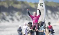  ?? PHOTO: DEREK/NZ SURF JOURNAL ?? Southern success . . . Dunedin junior Alexis Owen celebrates winning the under14 boys division.