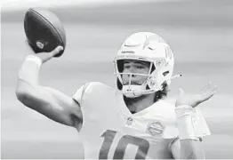  ?? HARRY HOW GETTY IMAGES ?? Unlike last week, Chargers QB Justin Herbert has had a week to prepare for today’s start. And his family and friends have had a week to prepare to watch it.