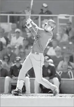  ?? Norm Hall Getty Images ?? SHOHEI OHTANI FLIES OUT to right field in the third inning. He also struck out looking and grounded into a force play against the Rockies.