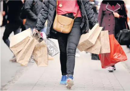  ?? Dominic Lipinski ?? > Footfall on Wales’ high streets declined by 2.7% in September