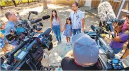  ?? DON BOOMER - FILE PHOTO ?? Noya Dahan and her parents, Eden and Israel Dahan, talked to the media at a birthday celebratio­n at Helen Woodward Animal Center.