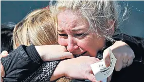  ??  ?? Relatives weep after the inquest jury in Warrington concluded that the 96 victims of the Hillsborou­gh disaster had been killed unlawfully