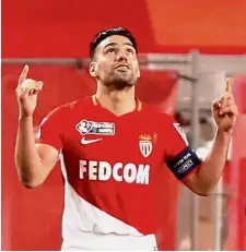  ??  ?? Solid strike: Monaco’s Radamel Falcao celebrates after scoring their second goal against Montpellie­r during the French League Cup semi-finals at Stade Louis II on Wednesday. — Reuters