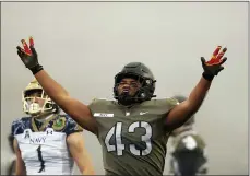  ?? ADAM HUNGER — THE ASSOCIATED PRESS ?? Army linebacker Jeremiah Lowery reacts during the first half of an NCAA college football game against Navy on Saturday in West Point, N.Y.