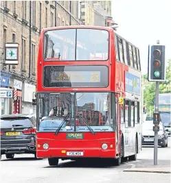  ?? Picture: Kris Miller. ?? An Xplore Dundee bus travelling through the city.