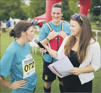  ??  ?? HOSTING EVENTS
Annelies James chatting to marathon runners at an event she hosted