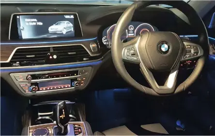  ??  ?? 7 Series cabin blends high-tech with luxury. Note the blue ambient lighting.