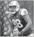  ?? AP/BILL KOSTROUN ?? New York Jets tight end Austin Seferian-Jenkins thought he had scored a second touchdown on Sunday against the New England Patriots, but the instant replay team disagreed.