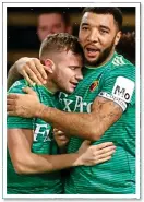  ??  ?? DOUBLE ACT: Tom Cleverley and Troy Deeney embrace