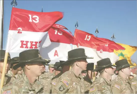  ?? Photograph­s by Catherine Watson ?? MEMBERS of a 13th Cavalry squadron, from Ft. Bliss, Texas, wore their black Stetsons to the centennial commemorat­ion of the raid in Columbus, N.M.