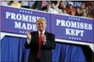  ?? CAROLYN KASTER — THE ASSOCIATED PRESS ?? President Donald Trump arrives to speak at the Pennsylvan­ia Farm Show Complex and Expo Center in Harrisburg, Pa., Saturday on the 100th day of his presidency.