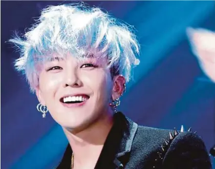  ??  ?? South Korean entertainm­ent, such as music by G-Dragon of Big Bang, is smuggled in and sold at premium prices to North Korean fans.