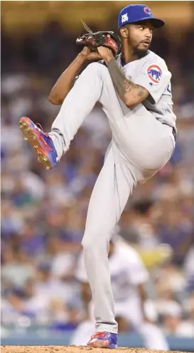  ?? | HARRY HOW/ GETTY IMAGES ?? Cubs reliever Carl Edwards Jr. retired all four batters he faced in Game 2 on Sunday, striking out three. “It’s like a new season all over again,” he said.