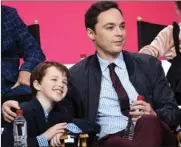  ?? The Associated Press ?? Iain Armitage, left, a cast member in the CBS series Young Sheldon, and executive producer/narrator Jim Parsons take part in a panel discussion.