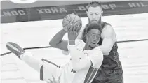  ?? CHRIS O’MEARA | AP ?? Heat center Bam Adebayo looks for a passing outlet during Friday night’s game against the Raptors.