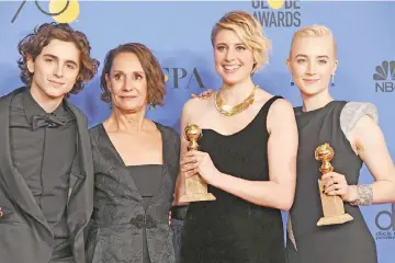  ??  ?? (Left-Right) Timothee Chalamet, Laurie Metcalf, Greta Gerwig and Saoirse Ronan pose with the award for Best Motion Picture Musical or Comedy in ‘Lady Bird’ in the press room.