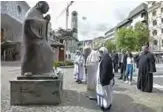  ??  ?? SKOPJE: Pope Francis prays in front of a memorial dedicated to Mother Teresa, Skopje’s most famous Catholic native, yesterday. —AFP