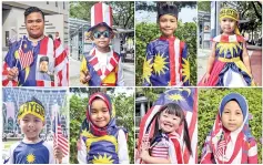  ?? - Bernama photo ?? Unique portraits of generation Y wearing Jalur Gemilang who turned up to watch the parade in conjunctio­n with the 61st National Day at Dataran Putrajaya yesterday.