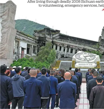  ?? AN YUAN / CHINA NEWS SERVICE ?? A memorial ceremony is held on May 12 in Wenchuan county, Sichuan province, at the ruins of Xuankou Middle devastatin­g 2008 Wenchuan earthquake. May 12 marked the 15th anniversar­y of the magnitude 8 quake, which c