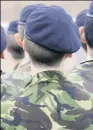  ??  ?? LAD’S ARMY A young cadet