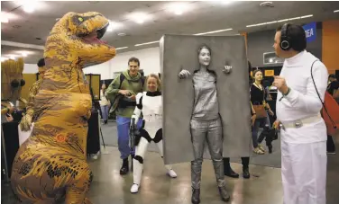  ?? Scott Strazzante / The Chronicle 2016 ?? Kayla Iacovino of Menlo Park dresses as Han Solo frozen in carbonite at Silicon Valley Comic Con in 2016.