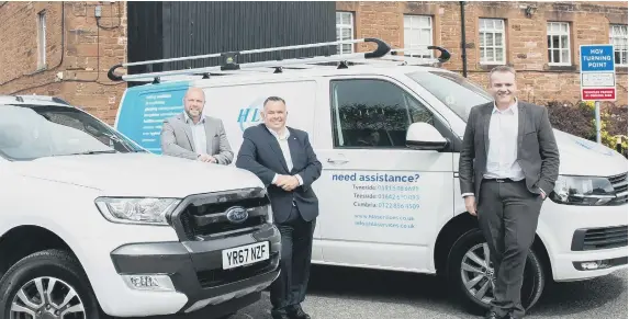  ??  ?? From left, Marcus West, HLA manager for the North West, with the firm’s directors Neil Henry and Paul Smith.