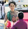  ?? PHOTO: REUTERS ?? The Lady . . . Burma’s State Counsellor Daw Aung San Suu Kyi receives flowers on her arrival in Manila for the Asean summit yesterday.