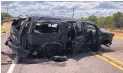  ?? DAVID CALTABIANO/KABB/WOAI ?? This SUV was carrying more than a dozen people fleeing from Border Patrol agents when it rolled over in Big Wells, Texas. At least five died.