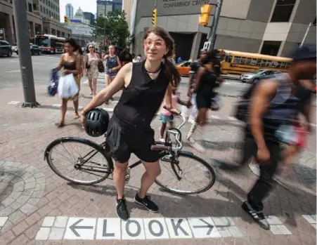  ?? JESSE WINTER/TORONTO STAR ?? Star reporter Laura Beeston got run off the road by a motorist last week, leading her to reflect on the joys and hardships of being a cycling commuter.