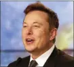  ?? JOHN RAOUX — THE ASSOCIATED PRESS ?? In this file photo Elon Musk, Tesla CEO, speaks during a news conference at the Kennedy Space Center in Cape Canaveral, Fla. Tesla is now worth more than General Motors, Ford and Fiat Chrysler combined.