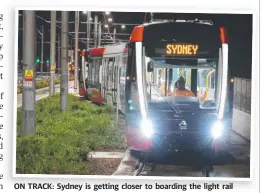  ?? Picture: BILL HEARNE ?? ON TRACK: Sydney is getting closer to boarding the light rail system as testing of the trams is carried out through the night at Alison Rd, Randwick.