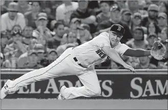  ?? WINSLOW TOWNSON/AP PHOTO ?? Brock Holt of the Boston Red Sox can’t get to a single by Yan Gomes of the Cleveland Indians during the fourth inning Wednesday in Boston.